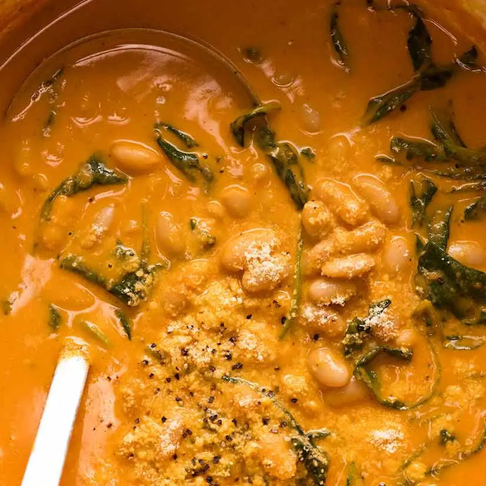 Creamy Coconut Tomato Soup with Cannellini Beans & Basil